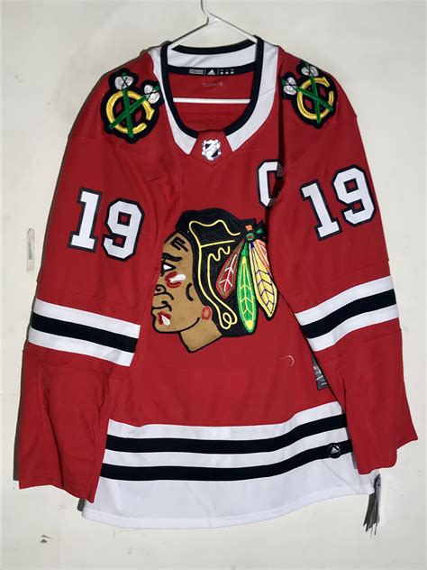 who makes authentic nhl jerseys